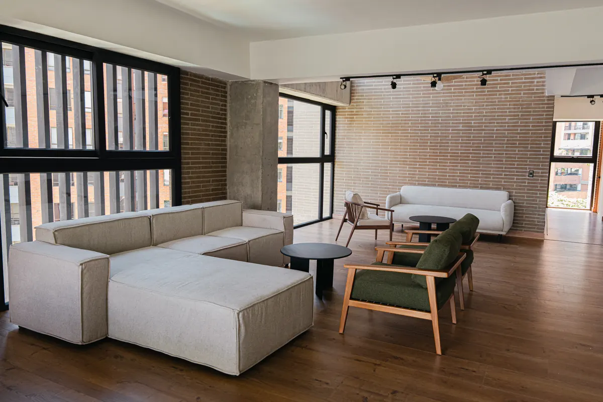 The penthouse's second living room with a modular sofa